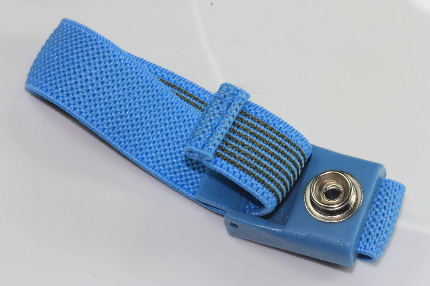 Wrist band, adjustable blue elasticated cloth with 10mm stud